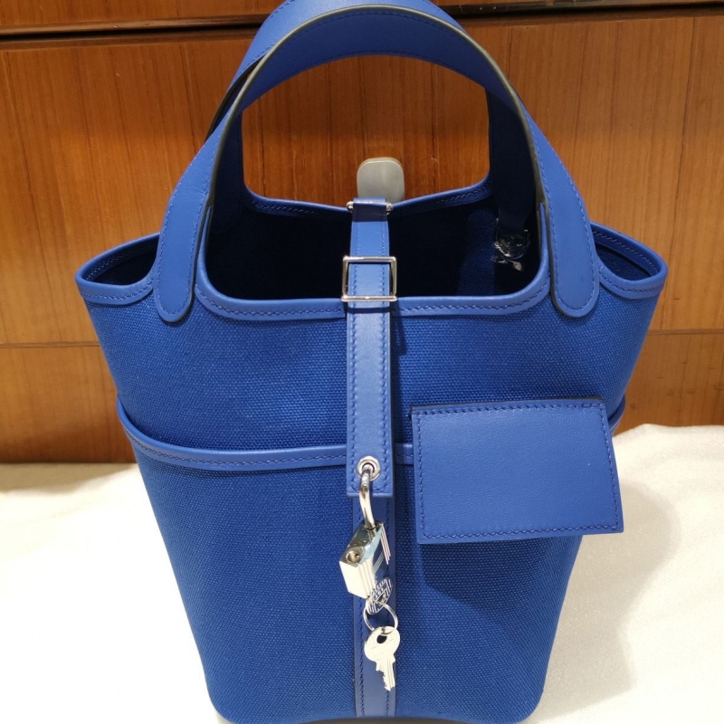 H**mes shopping bags